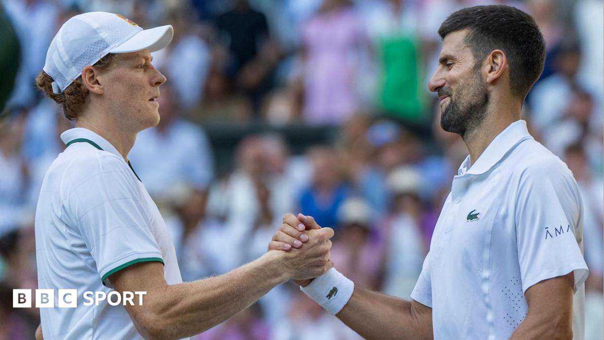 Jannik Sinner and Novak Djokovic clasp hands at the net following their semi-final at Wimbledon