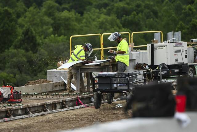 Work continues on the new Commercial Street Bridge on Wednesday. PennDOT officials said the work is ahead of schedule and