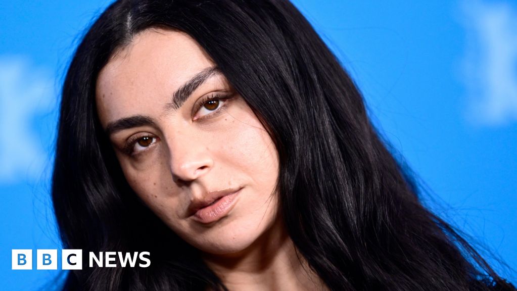 Charli XCX - close up of her face and long, dark hair