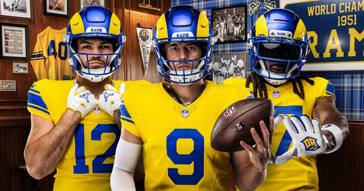 Rams players (from left) Puka Nacua, Matthew Stafford and Davante Adams showcase the Rams' new uniforms for 2026