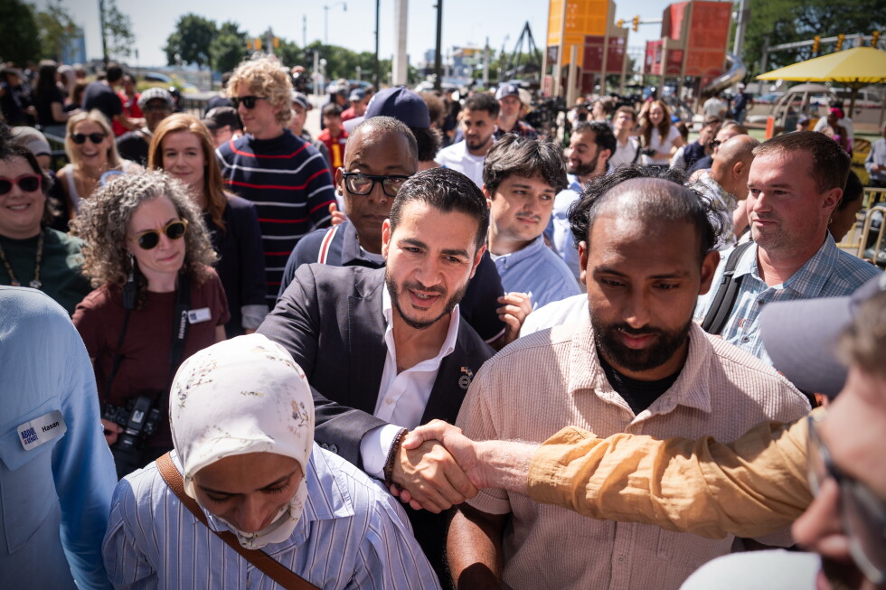 Abdul El-Sayed departs following a news conference at the Spirit of Detroit shortly after winning the Democratic nomination