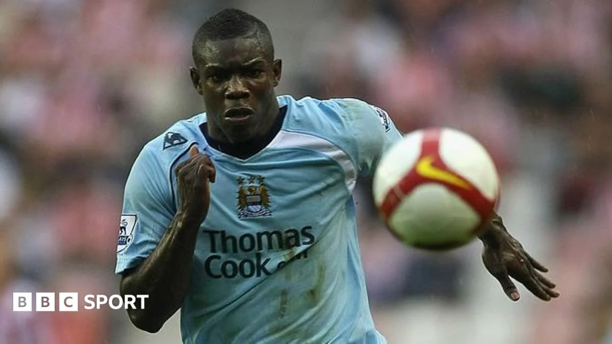 Micah Richards chases the ball while playing for Manchester City