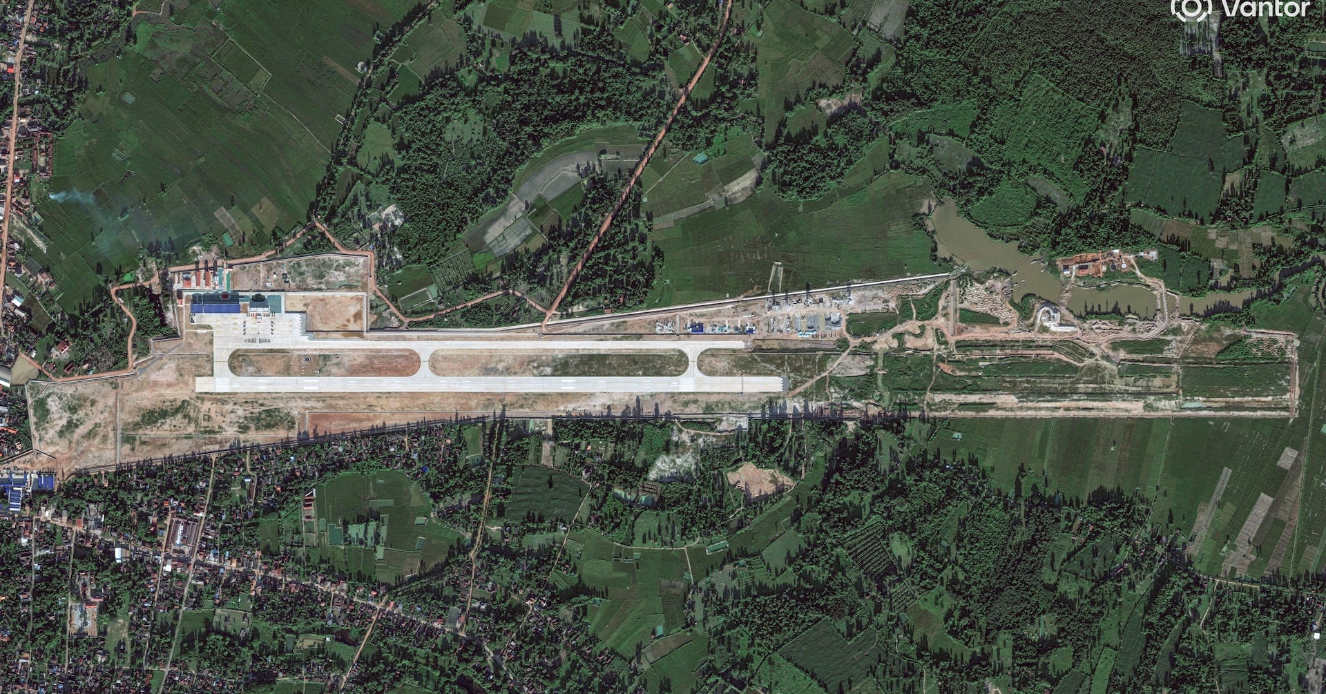 A satellite image shows a new China-Laos joint training facility, with a runway that is being expanded, in Ban Keun